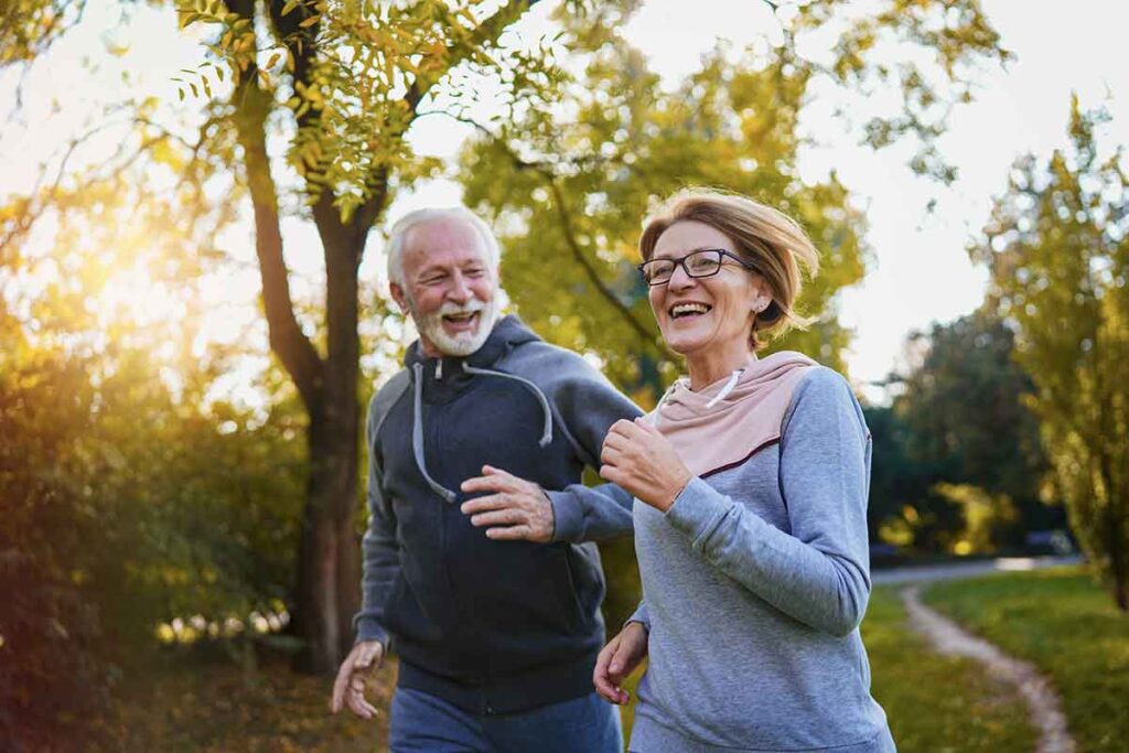 Elderly couple jogging